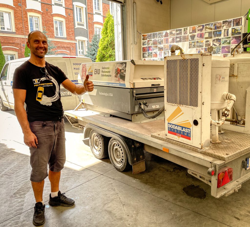 Maszyna do sodowania ze swoim właścicielem